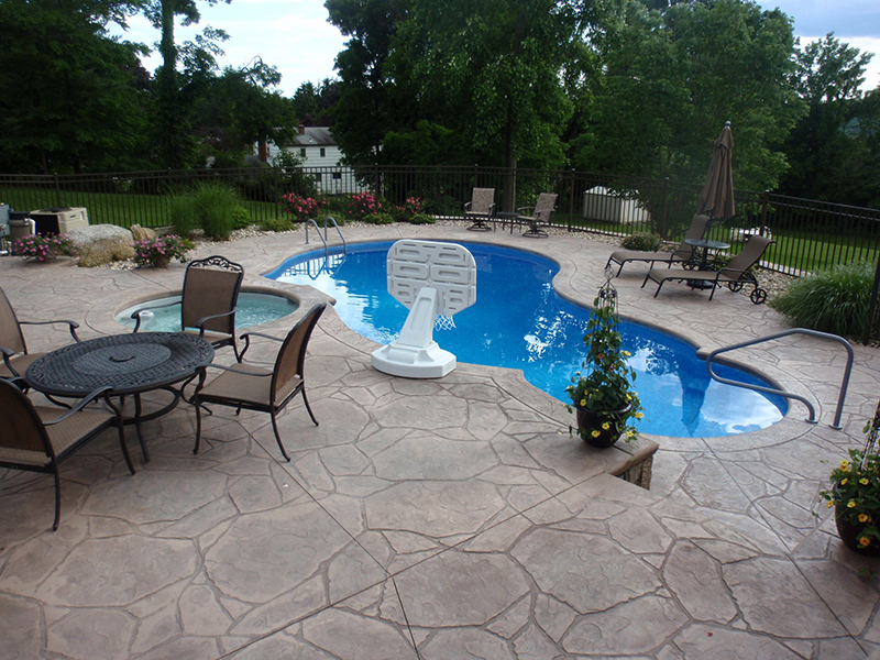 Swimming pool and stamped concrete project example 41